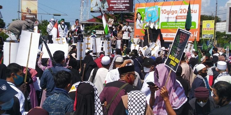 Aksi Damai di Tugu Adipura, Warga Lampung Bela Al Aqsa dan Kutuk Kebiadaban Zionis Israel