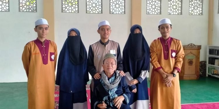 Fahmi sang penghafal Al Quran.